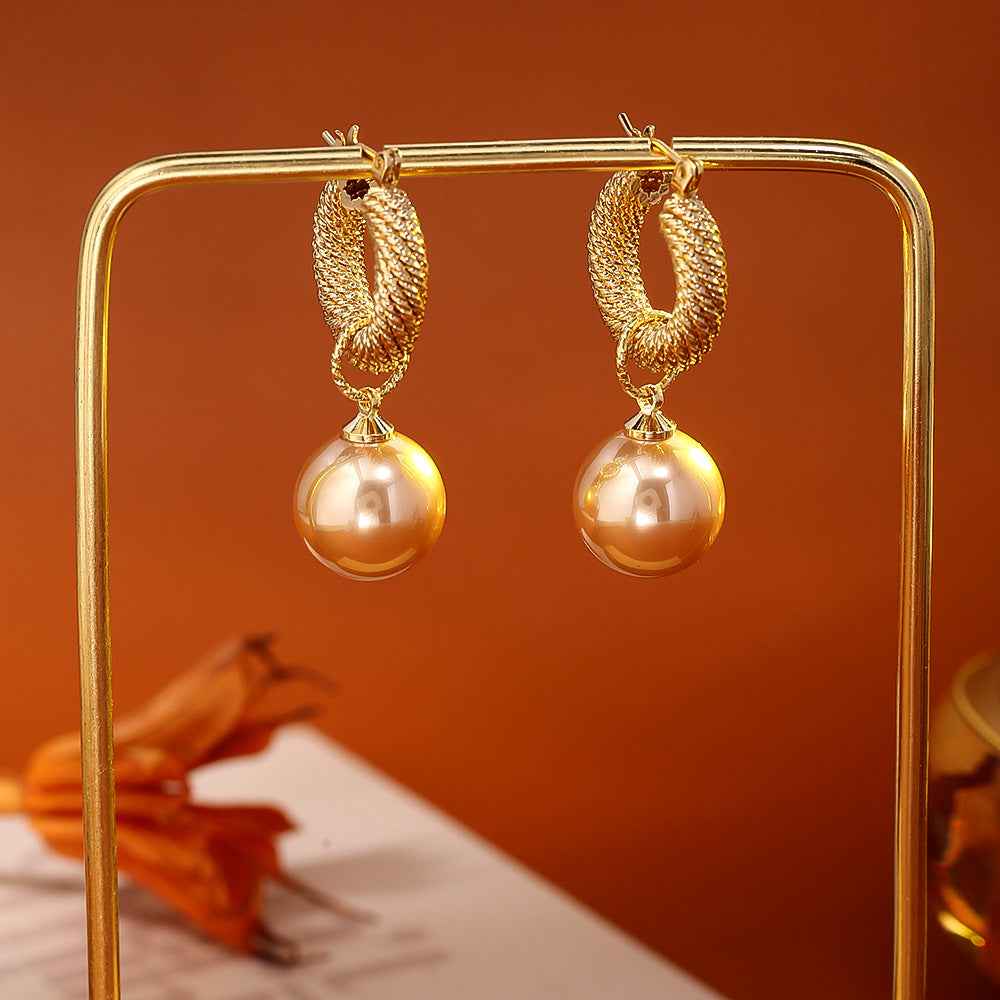 New French - style Champagne Pearl Earrings. Retro and High - end Hong Kong - style Earrings for Women. Trendy Drop Earrings with Light - Luxury Ear Clasps.