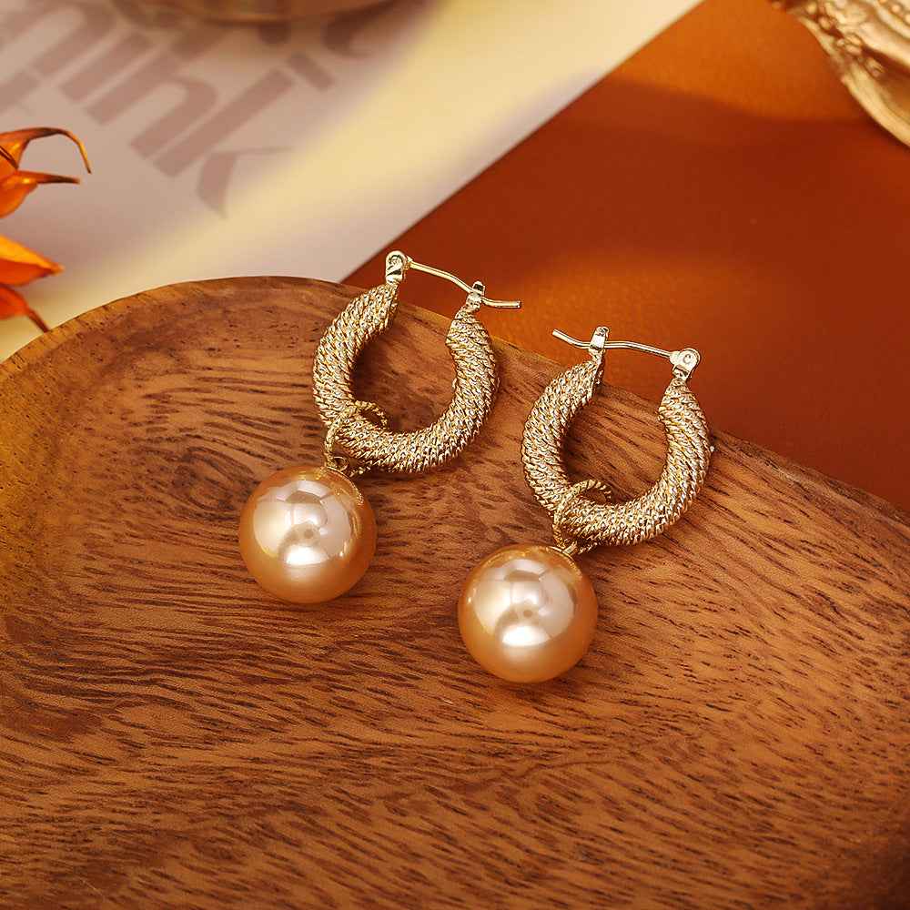 New French - style Champagne Pearl Earrings. Retro and High - end Hong Kong - style Earrings for Women. Trendy Drop Earrings with Light - Luxury Ear Clasps.