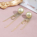 Dopamine - inspired Mabe Pearl and Cubic Zirconia Tassel Earrings: Stylish, Sophisticated, Exuding Elegance. Delicate and Fresh - looking Ear Ornaments