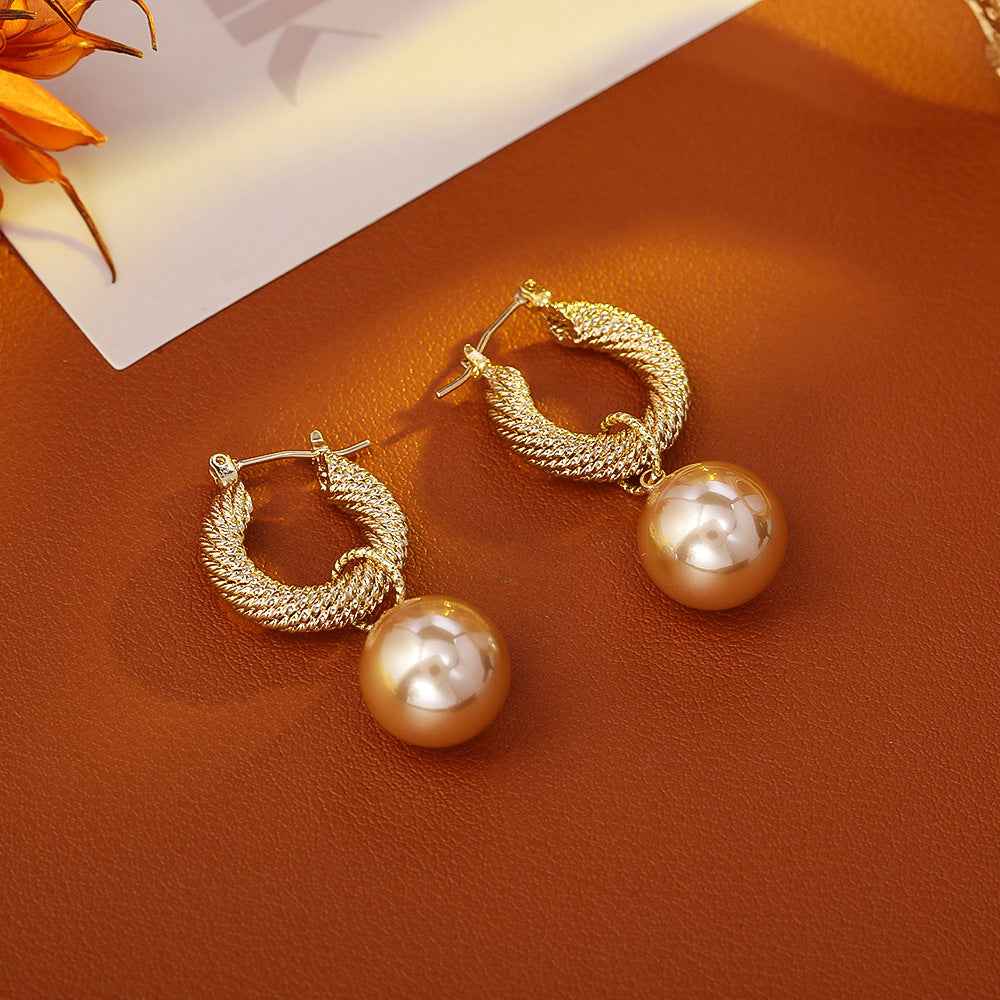New French - style Champagne Pearl Earrings. Retro and High - end Hong Kong - style Earrings for Women. Trendy Drop Earrings with Light - Luxury Ear Clasps.