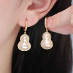 Gourd-shaped Pearl Earrings with Copper Plated Real Gold and Zircon Inlay: Light Luxury, High-End, Unique Design, Stylish and Elegant Earrings.