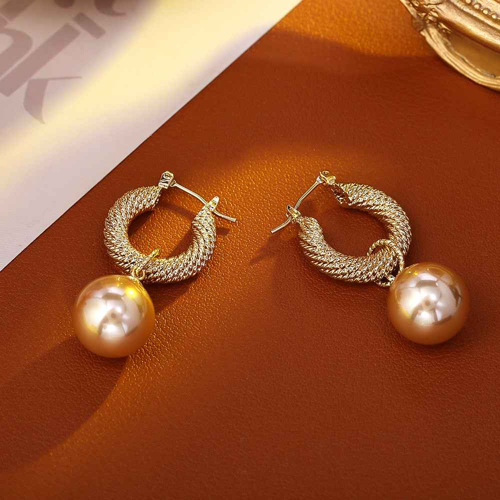 New French - style Champagne Pearl Earrings. Retro and High - end Hong Kong - style Earrings for Women. Trendy Drop Earrings with Light - Luxury Ear Clasps.