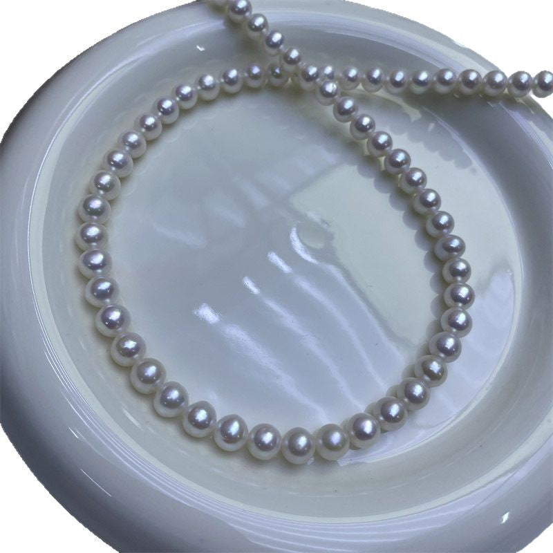 High-grade near-round natural freshwater pearls 7-8mm strong light comparable to Japan's Akoya seawater pearl necklace work in progress